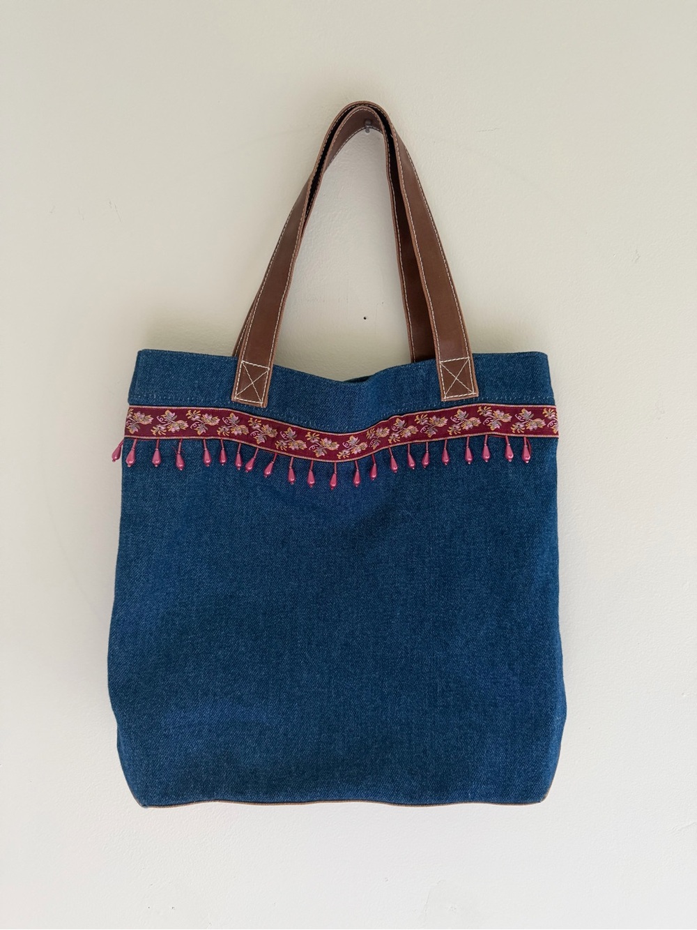 Denim Tote Bag with Pink Embroidered Trim and Brown Leather Handles